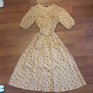 Cream polka dotted midi dress